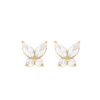Des boucles d'oreilles en forme de papillon